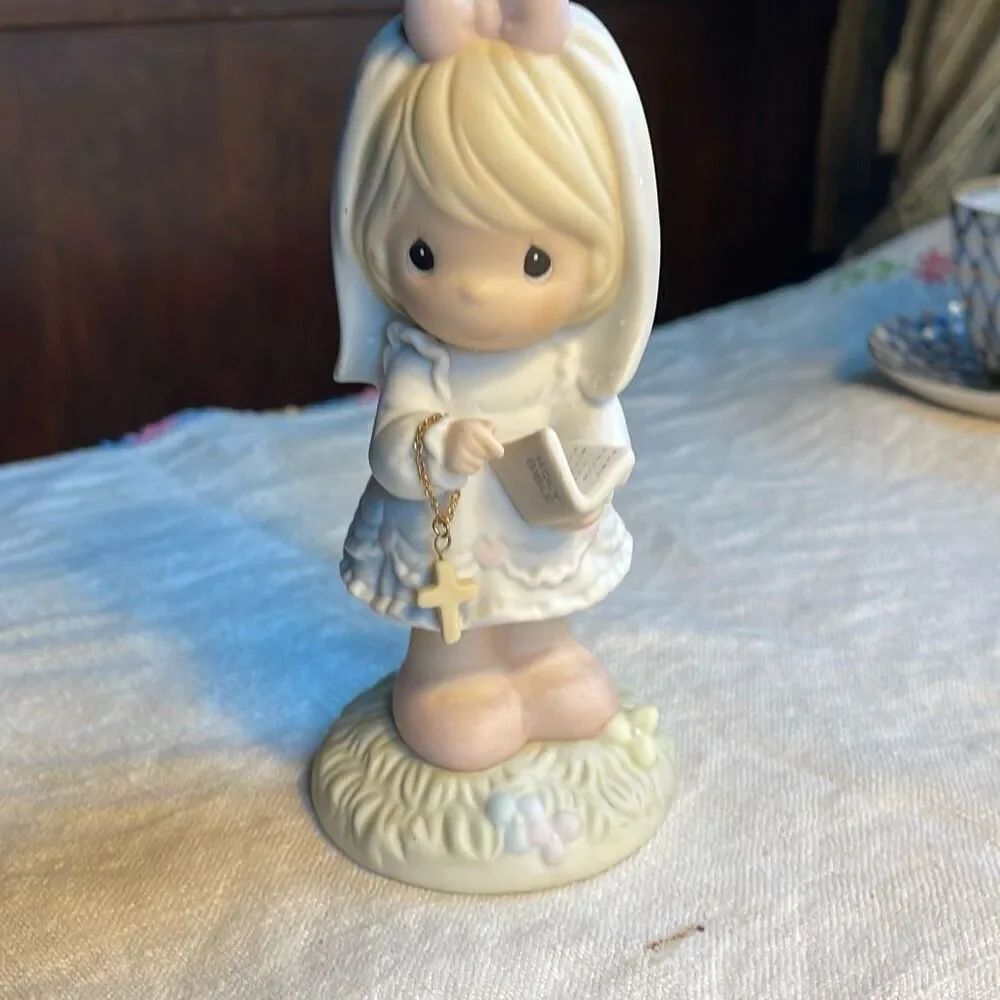 Precious Moments 1989 “ This has Been Made in Heaven” bible cross figurine.